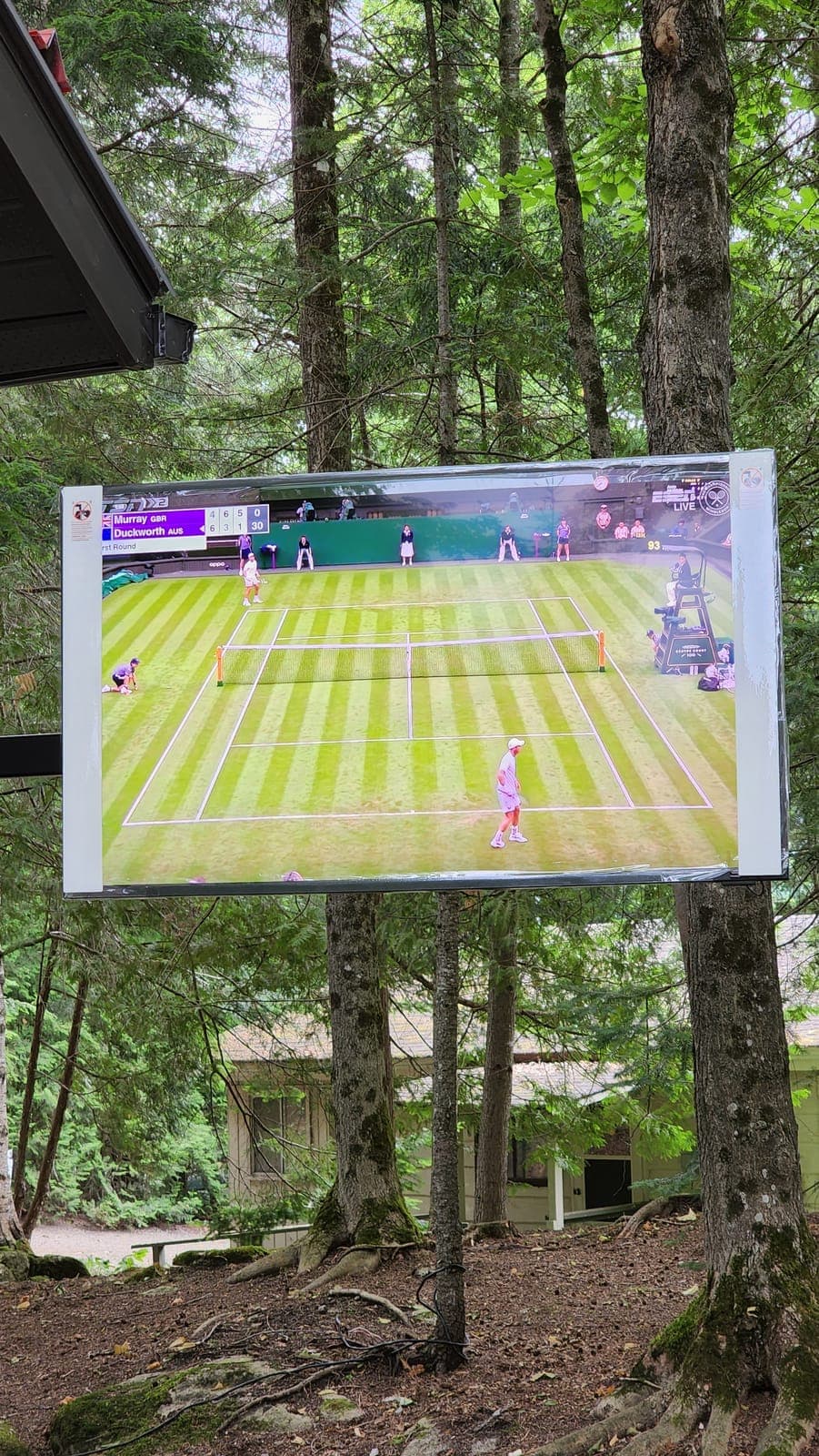 Outdoor TV showing a live broadcast